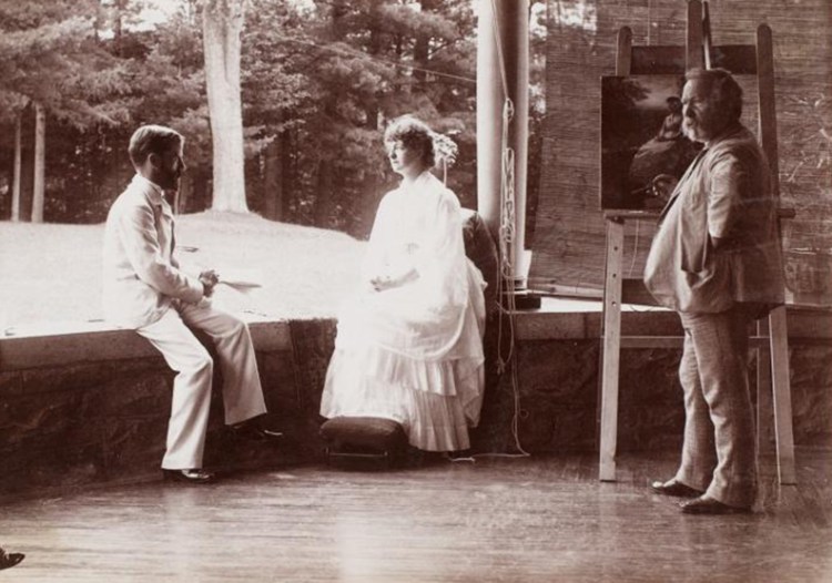 Eastman Johnson making a study for portrait of Katrina Trask while Spencer Trask sits facing her, ca. 1870 - 1910. 
