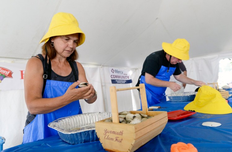  Beattie Quintal of Waldoboro competes in the clam shucking contest at the Yarmouth Clam Festival in 2017. 