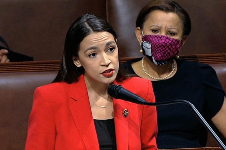  In this July 23 file image from video, Rep. Alexandria Ocasio-Cortez, D-N.Y., speaks on the House floor on Capitol Hill in Washington. Her impassioned remarks on the House floor against the vulgar words of a male colleague and a toxic culture that allows it, have resonated with women who say such language has been tacitly accepted for far too long. Rep. Nydia Velázquez, D-N.Y., is seated at right. 