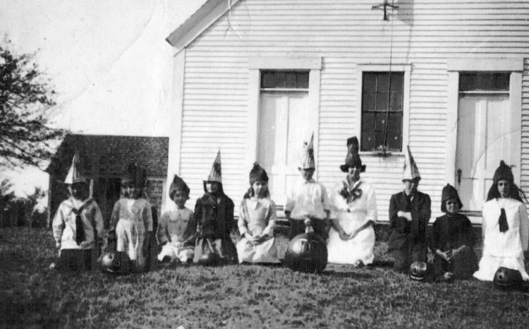 These Shepherd School students in the class of 1930-31 show off their home-made hats for Halloween. The Shepherd School was off the Mountain Road and one of the 17 one-room schoolhouses that served Jefferson students over the years. The only students identified are Robert Madden (3rd from the right) and his sister Frances (3rd from the left).