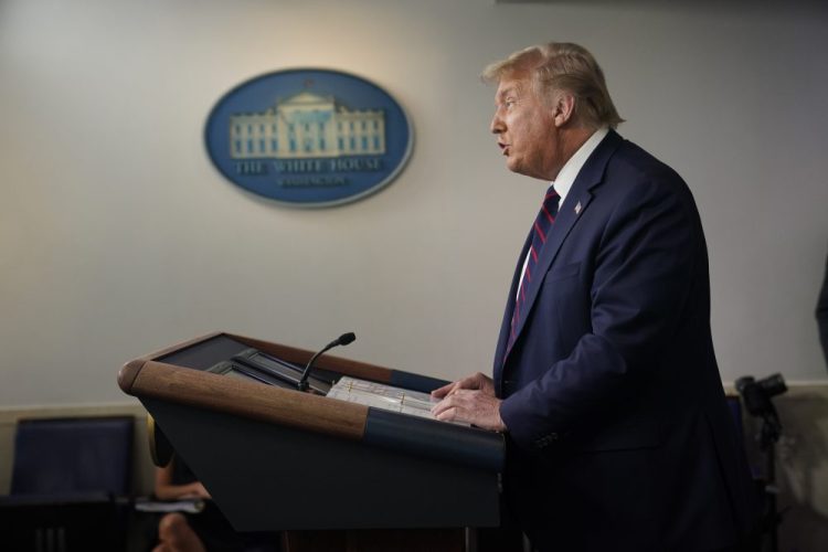 President Trump speaks during a news conference on Tuesday. He signed a memo that seeks to bar people in the U.S. illegally from being included in the headcount as congressional districts are redrawn. 