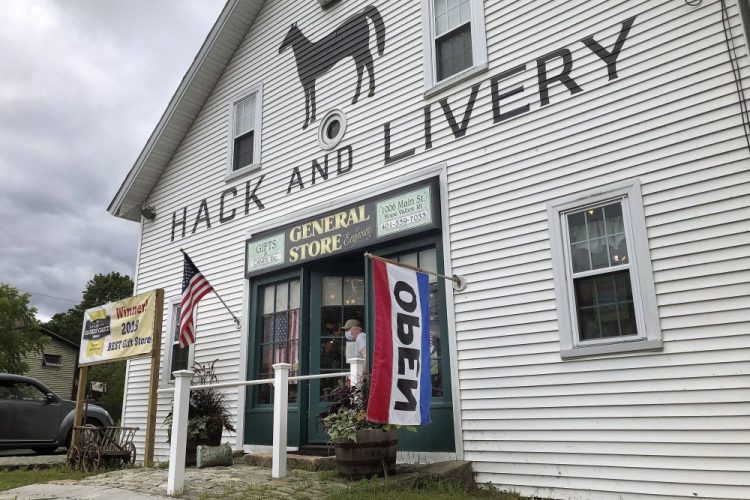 A man leaves a gift shop July 15 in Hope Valley, R.I. Futurists and others say people may actually look back at 2020 with nostalgia if the coronavirus pandemic lingers and health and economic concerns worsen. 

