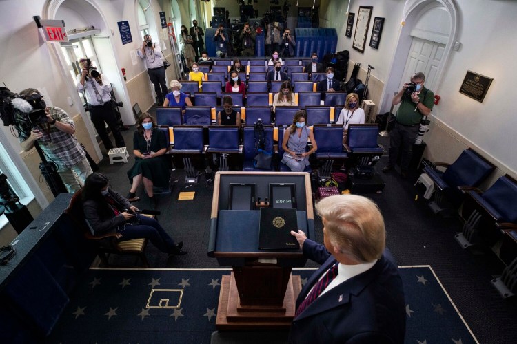 President Donald Trump arrives to speak during a briefing with reporters in the James Brady Press Briefing Room of the White House, Tuesday, Aug. 4, 2020, in Washington.(AP Photo/Alex Brandon)