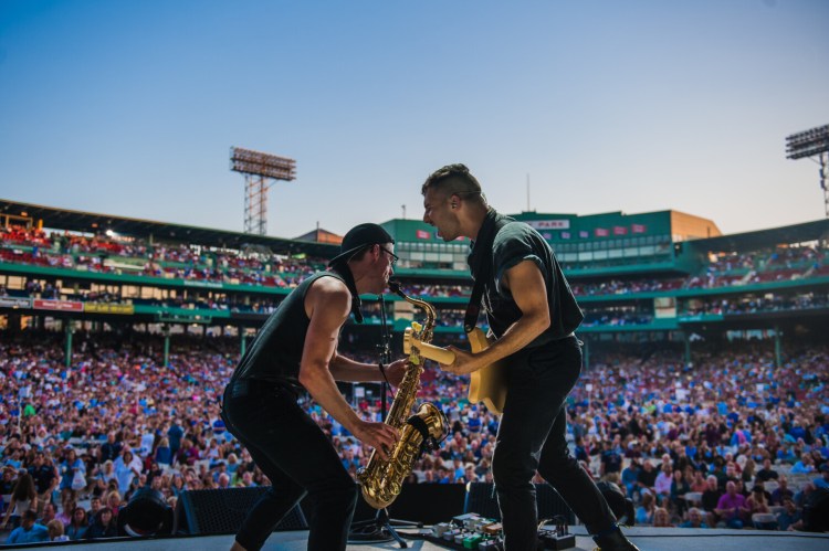 Evan Smith, on saxophone, performing with Bleachers as part of of a 2015 Billy Joel concert Fenway Park in Boston. 
