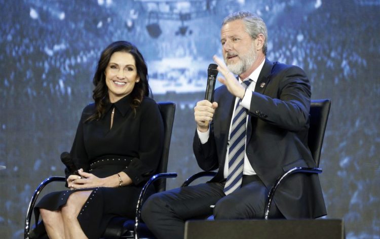 The Rev. Jerry Falwell Jr., right, and his wife, Becki during after a town hall at a convocation at Liberty University in Lynchburg, Va. on Nov. 28, 2018. 