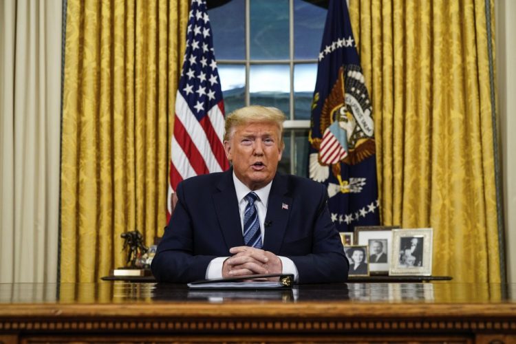 President Trump speaks on March 11  in an address to the nation from the Oval Office about the coronavirus. The U.S., he told Americans, would “expeditiously defeat this virus.” Doug Mills/The New York Times via AP