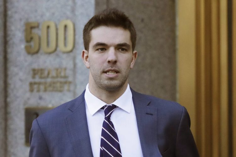 Billy McFarland, the promoter of the failed Fyre Festival in the Bahamas, leaves federal court after pleading guilty to wire fraud charges in New York in 2016. 
