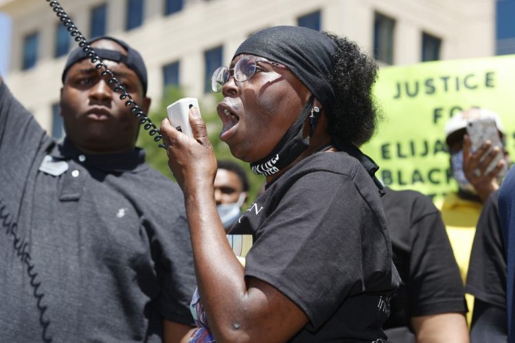 Sheneen McClain, mother to Elijah McClain, speaks during a rally and march on June 27 over the death of her son. The McClain's filed a lawsuit again Aurora, Colo., police. 