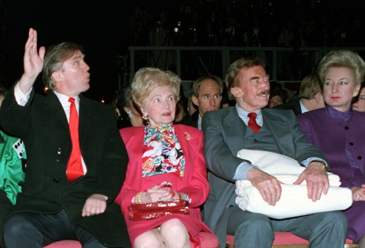 Donald Trump next to his mother, father and sister, Maryanne Trump Barry, on April 6, 1990, in Atlantic City, N.J. 