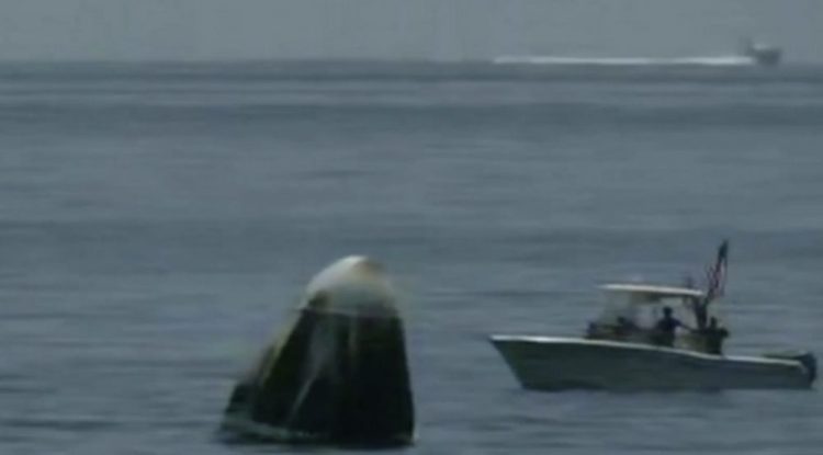 The SpaceX capsule floats Sunday in the Gulf of Mexico. Astronauts Doug Hurley and Bob Behnken spent a little over two months on the International Space Station. It will mark the first splashdown in 45 years for NASA astronauts and the first time a private company has ferried people from orbit.