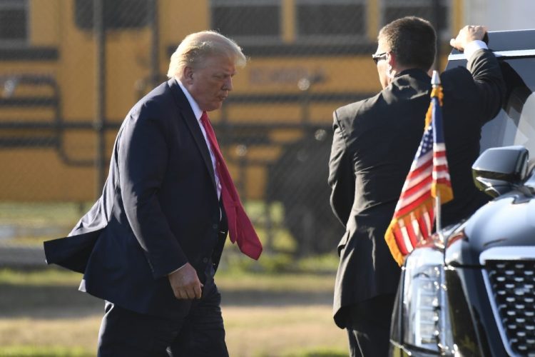 President Trump walks to his car after arriving in Southampton, N.Y., on Marine One, Saturday.