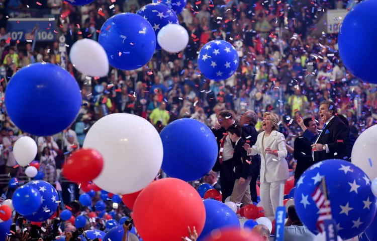 Democratic presidential nominee Hillary Clinton celebrates after accepting the nomination in Philadelphia on July 28, 2016. This year’s event, which begins Monday, will be almost entirely virtual. 