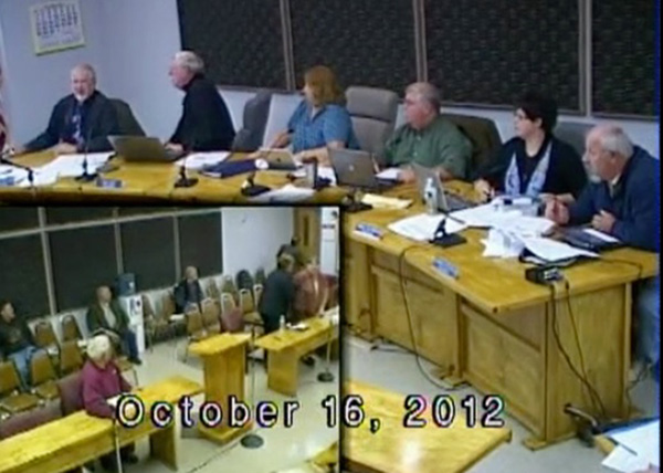 Waterboro selectmen and the audience react as the chamber is rocked by an earthquake on Oct. 16, 2012.