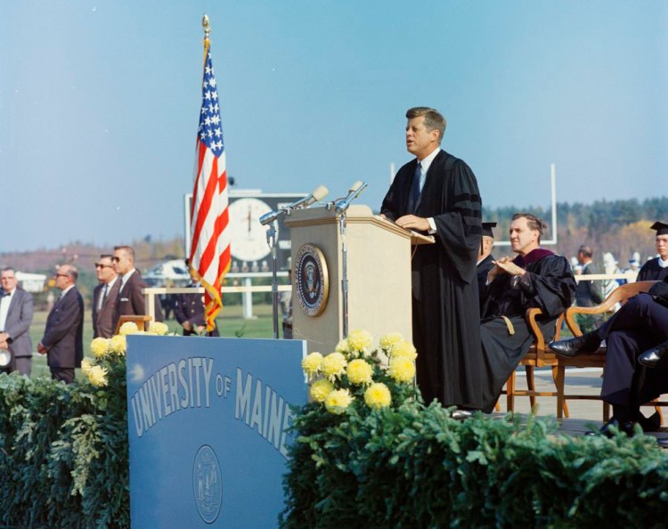 President John F. Kennedy speaks at the University of Maine in Orono on October 19, 1963. Sen. Edmund Muskie sits behind and to the right of the president.

