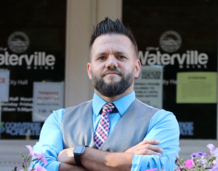 Waterville Mayor Jay Coelho stands outside of City Hall in 2020. A YouTube channel alleges Coelho is unprofessional, in part, because of his posts on social media. 
