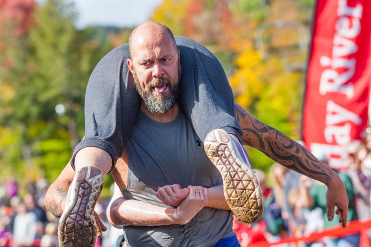 The North American Wife Carrying Championship will be held Oct. 9 at Sunday River, but with fans a little farther from the action. 
