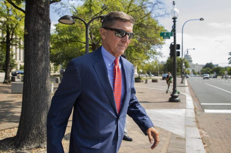 Michael Flynn, President Trump's former national security adviser, leaves court following a status conference in Washington last September. Flynn was the highest-ranking Trump adviser charged in special counsel Robert Mueller's Russia investigation.