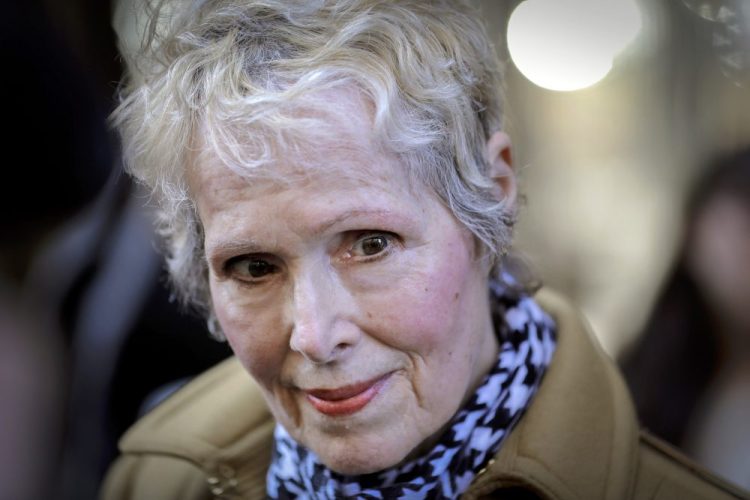 E. Jean Carroll talks to reporters outside a courthouse in New York on March 4. The U.S. Justice Department is seeking to take over President Trump's defense in a defamation lawsuit brought by Carroll, who accused the president of raping her in a New York luxury department store in the mid-1990s. Federal lawyers asked a court Tuesday to allow a legal move that could put the American people on the hook for any money she might be awarded.