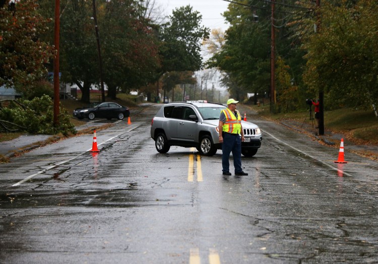 A downed power line prompted the closure of a portion of Saco Street in Westbrook near Saccarappa School on Wednesday. 
