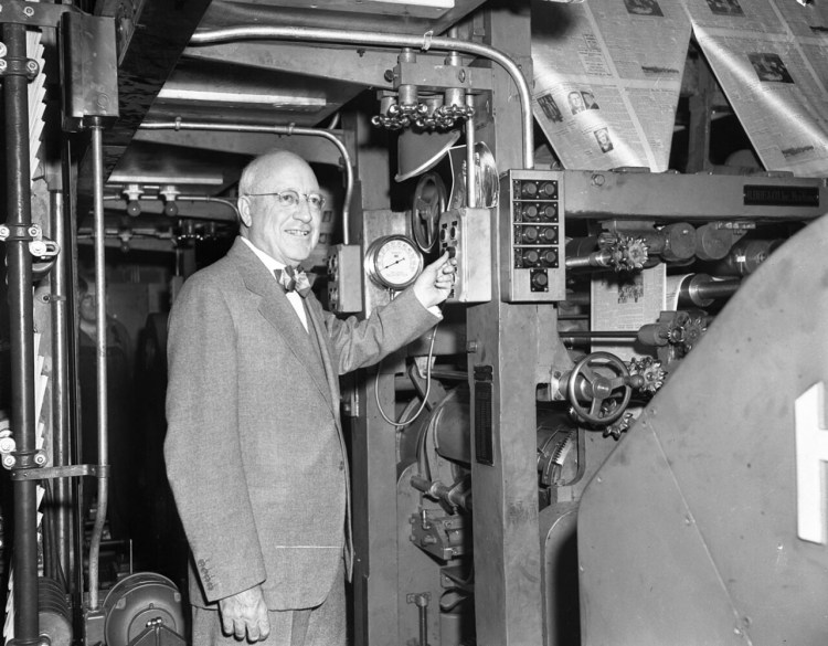 April 1948 : Guy P. Gannett, switching on new Hoe presses in Portland Press Herald pressroom. 