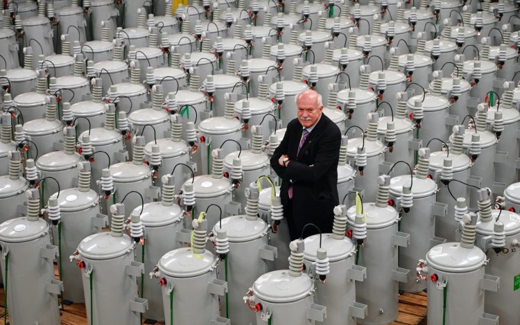 David Flanagan, executive chairman of Central Maine Power, stands among an array of power transformers in Augusta in October 2020. Flanagan was CMP's chief executive from 1994 to 2000, during which time he was credited with leading a company turnaround. He has been diagnosed with pancreatic cancer and is undergoing treatment.