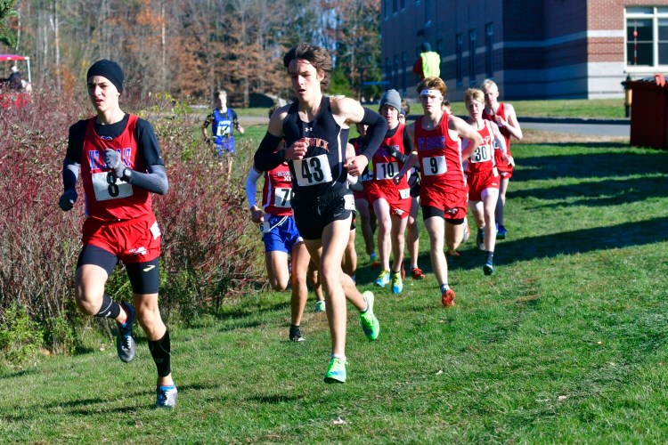 AUGUSTA, ME - OCTOBER 31: Mt. Ararat 8 Grady Satterfield, and Brunswick 43 Tyler Patterson off to an early lead during Kennebec Valley Athletic Conference cross country meet Saturday October 31, 2020 at Cony High School in Augusta. Patterson won in 16:46 and Satterfield was second in 16:58. (Staff photo by Joe Phelan/Staff Photographer)