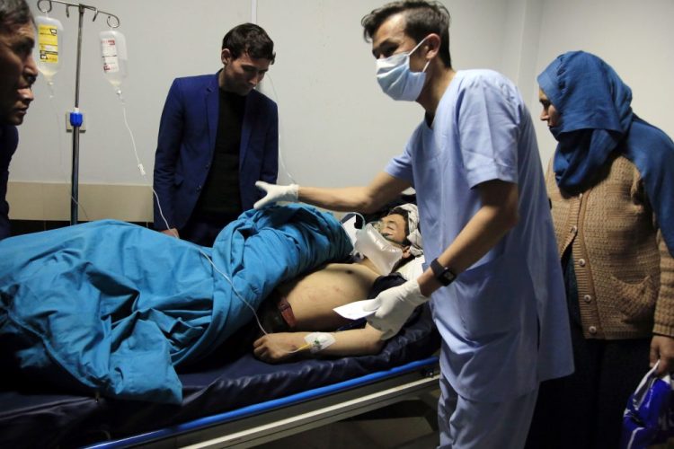 An Afghan receives treatment at hospital after a suicide attack in Kabul on Saturday.