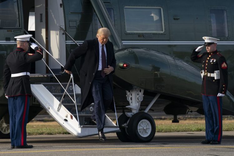 President Trump steps off of Marine One at Morristown Municipal Airport in Morristown, N.J., after attending a fundraiser at Trump National Golf Club in Bedminster on Thursday. 
