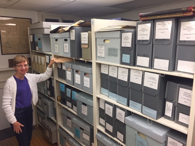 KHS Archivist Emily Schroeder surveys the vast collections to be inventoried. 