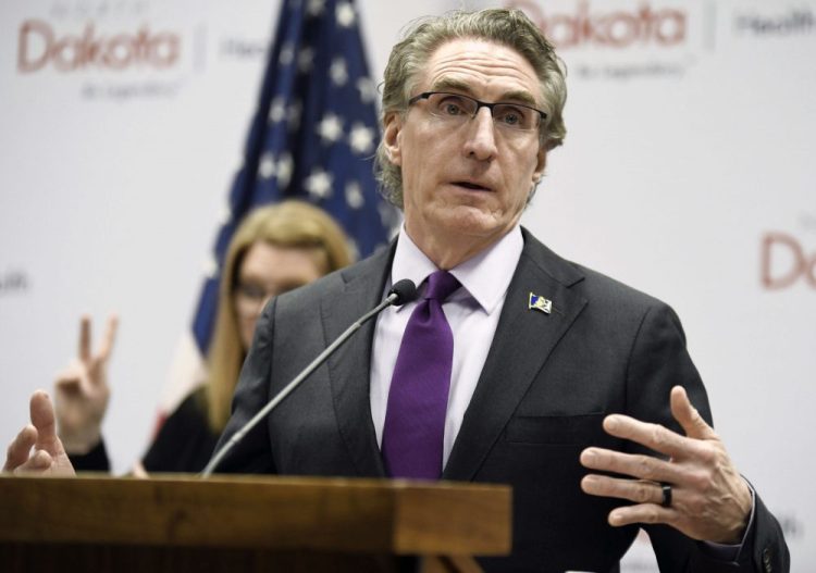 North Dakota Gov. Doug Burgum speaks at the state Capitol on April 10 in Bismarck, N.D. Hospitalizations from COVID-19 have hit their highest points recently throughout the Midwest, where the growth in new cases has been the worst in the nation. Doug Burgum, North Dakota's Republican governor, acknowledges his state's numbers are moving in the wrong direction as it hit new highs for active and newly confirmed cases, as well as hospitalizations. But he's also touting the state's test positivity staying in the 7 percent range.