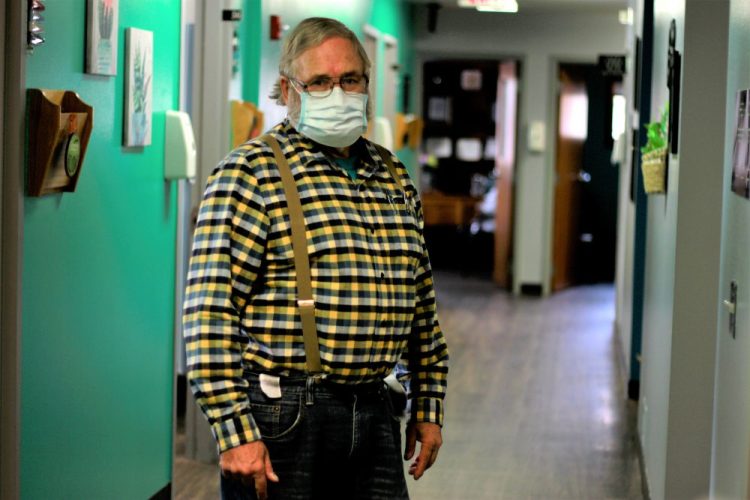 Dr. Tom Dean at his clinic in Wessington Springs, S.D., on Friday. He is one of three doctors in the county, which has seen one of the nation's highest rates of coronavirus cases per person. He writes a column in the local newspaper, the True Dakotan, urging people to take precautions. 