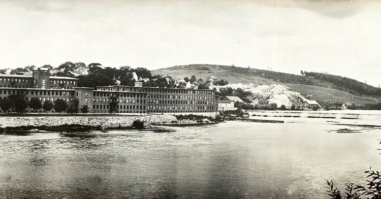 A partial view of the Edwards Manufacturing Company mill, left, and dam, right, on the banks of the Kennebec River in Augusta from 1910.