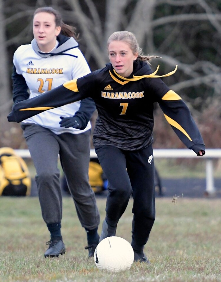 Maranacook's Lily Caban, right, breaks away with the ball during a scrimmage Monday in Readfield.