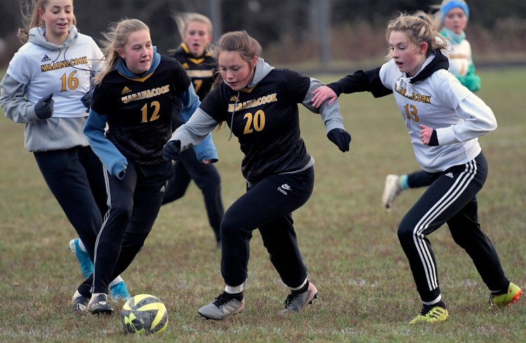 READFIELD, ME - NOVEMBER2: Maranacook Community High School's women soccer team players scramble Monday November 2,2020 for the ball during an intramural scrimmage in Readfield.Andy Molloy/Kennebec Journal