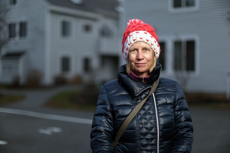 Judy Sedgewick, photographed in South Portland on Thursday, and her family have vacationed in Maine during the summer for years and decided this summer that they would move here full time from Massachusetts.
