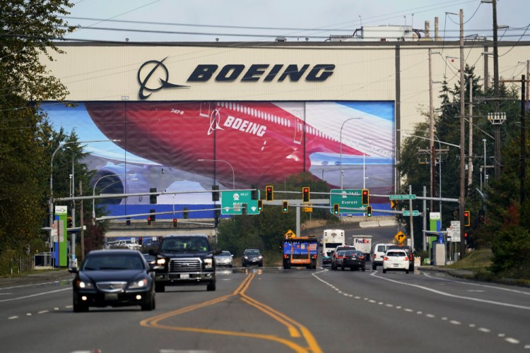 Traffic passes the Boeing airplane production plant in Everett, Wash. An EU official said most European countries see President-elect Joe Biden's victory “as an opportunity for us to take a new approach to our trade relationship ... with the U.S.” 