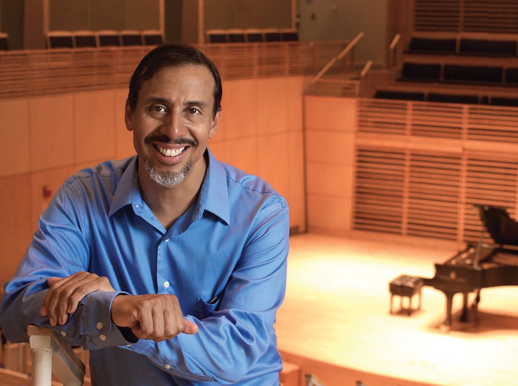 George Lopez, pianist and conductor of the Bowdoin Chamber Orchestra.