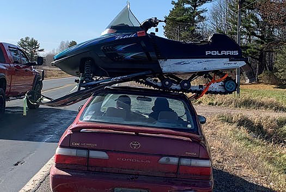 Snowmobile_Atop_Car_31854