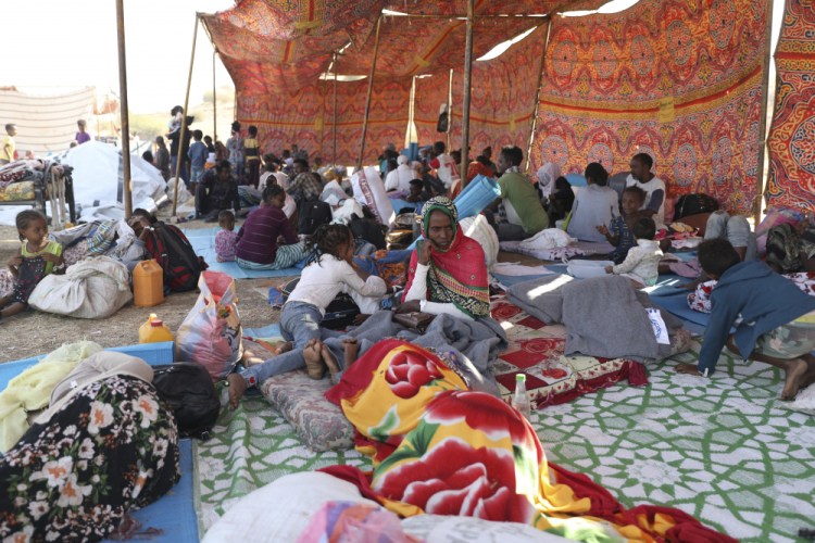Ethiopian refugees gather in Qadarif region, easter Sudan, on Friday. Thousands fled the war in the Tigray region.

