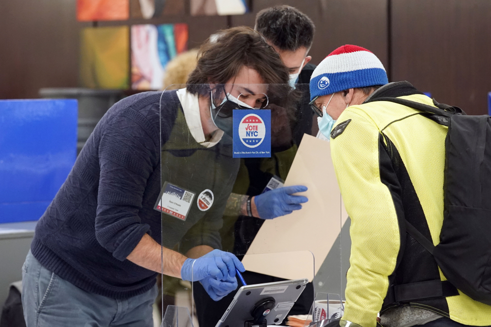 Virus_Outbreak_Poll_Workers_02406