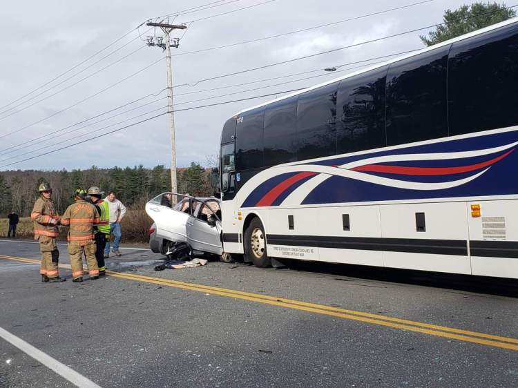 A father and son died after their car collided with a Concord Coach Lines bus on Route 1 in Thomaston Monday.