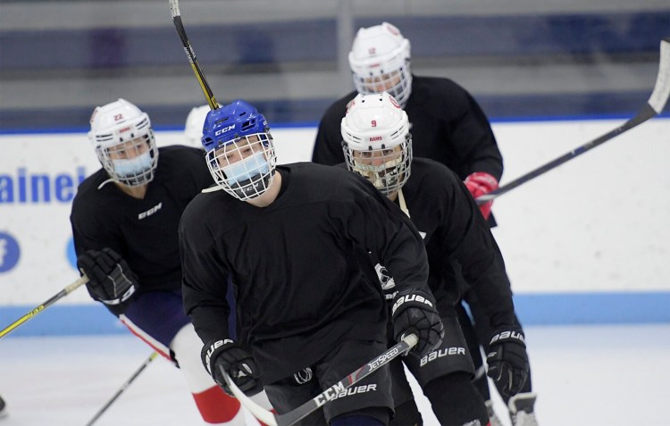 HALLOWELL, ME - DECEMBER 9: Cony High School hockey practice  Wednesday December 9,2020  at the Ice Vault in Hallowell.  Staff photo by Andy Molloy/Kennebec Journal