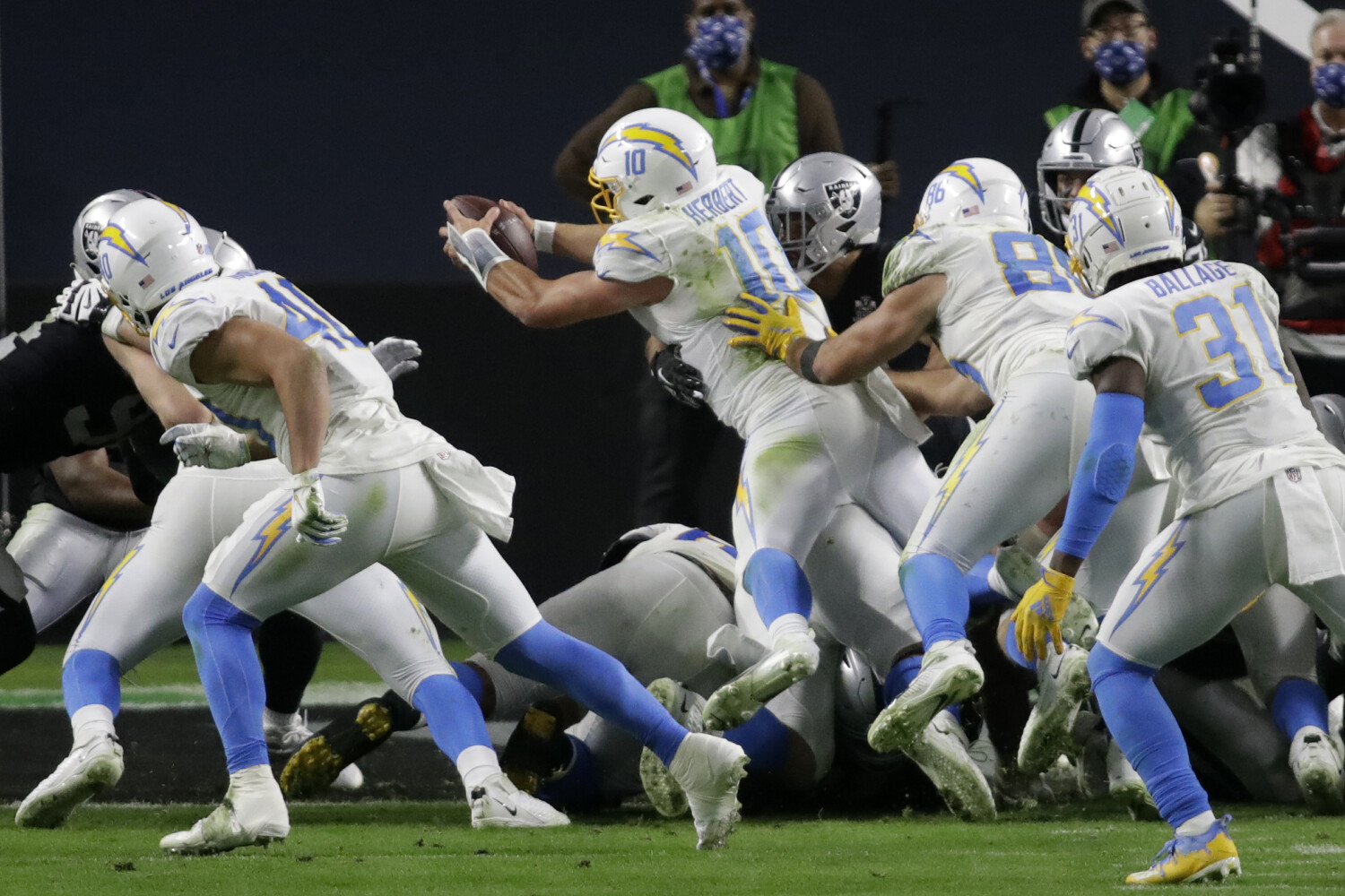 Raiders vs. Chargers score: Justin Herbert leads L.A. to an overtime win  over the Raiders and Marcus Mariota 