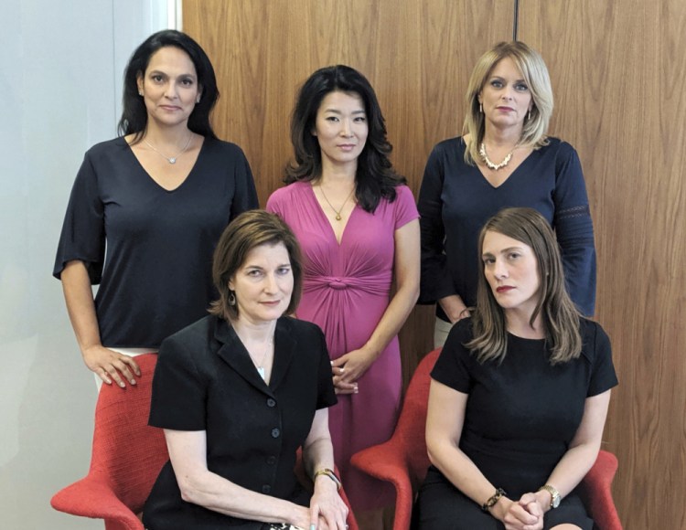 This undated photo provided by Wigdor Law in December shows anchorwomen from the NY1 news channel in New York. In the back row from left are Jeanine Ramirez, Vivian Lee and Kristen Shaughnessy. In the front row are Roma Torre, left, and Amanda Farinacci. 
