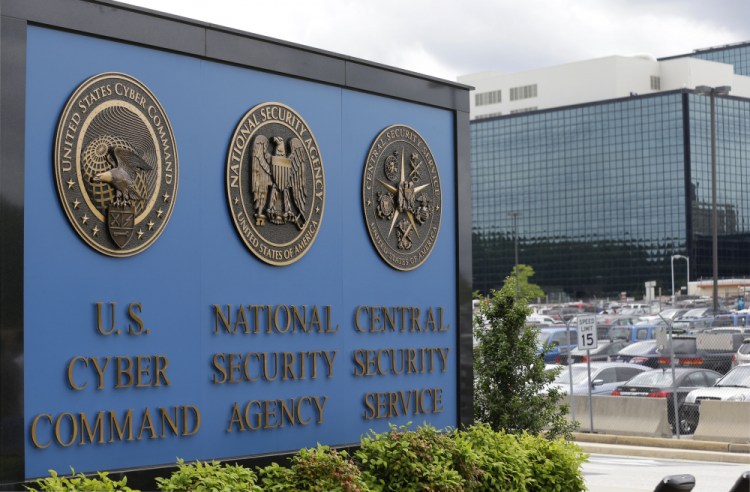 The sign outside the National Security Agency (NSA) campus in Fort Meade, Md. All fingers are pointing to Russia as author of the worst-ever hack of U.S. government agencies. But President Donald Trump, long wary of blaming Moscow for cyberattacks has so far been silent. 