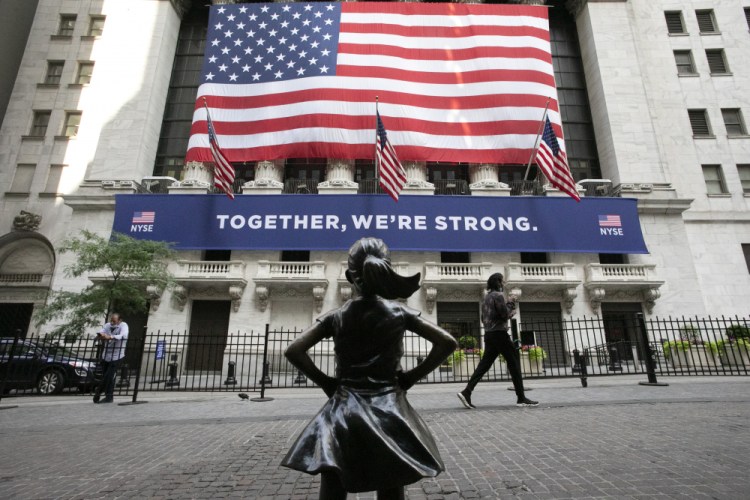 The Fearless Girl statue stands in front of the New York Stock Exchange.

 