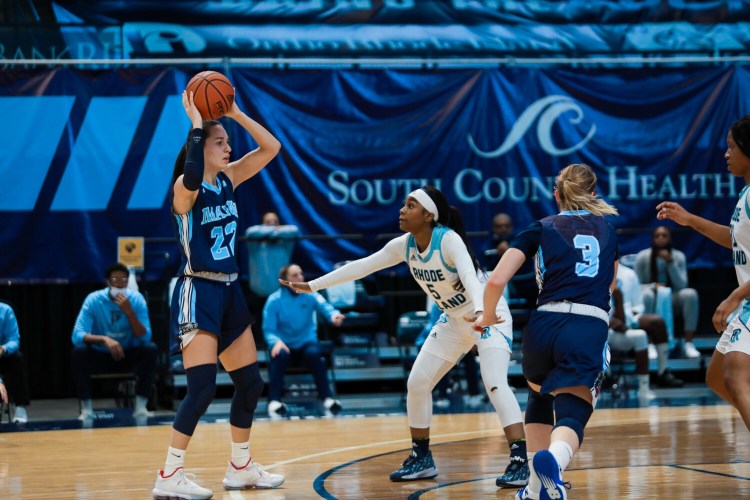 University of Maine guard Blanca Millan looks to make a pass as Rhode Island sophomore Yanni Hendley defends during a Dec. 11 game at the Ryan Center in South Kingstown, Rhode Island.