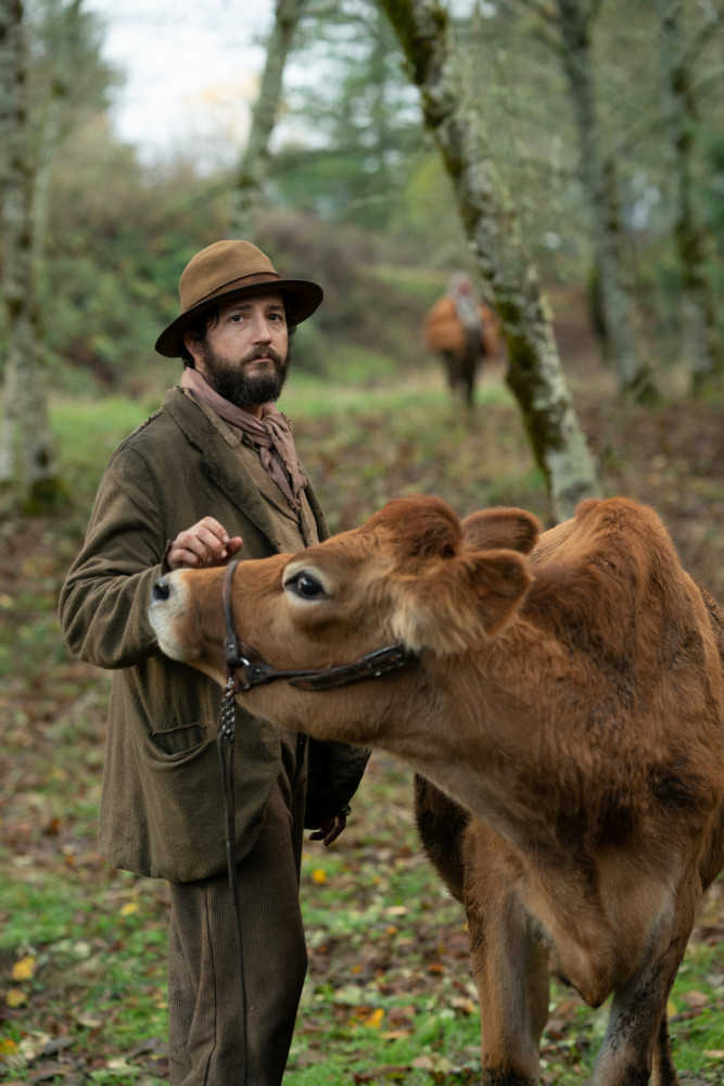 John Magaro in a scene from the film "First Cow." The New York Film Critics Circle on Friday voted Kelly Reichardt’s Western fable the best film of 2020.  (Allyson Riggs/A24 via AP)