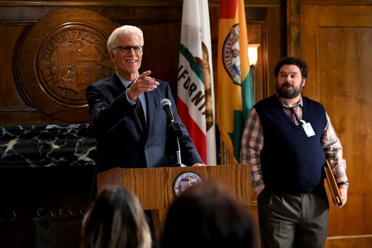 This image released by NBC shows Ted Danson as Mayor Neil Bremer, left, and Bobby Moynihan as Jayden Kwapis in a scene from the new comedy "Mr. Mayor," premiering on Thursday.  (Mitchell Haddad/NBC via AP)