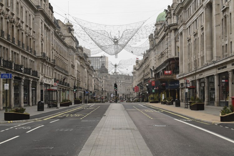 A view of an empty Regent Street, during what would normally be the Boxing Day sales. Boxing Day spending is expected to fall by more than a quarter compared with a year ago, after extensive new COVID-19 restrictions forced nonessential retailers to close, in London on Saturday. 
